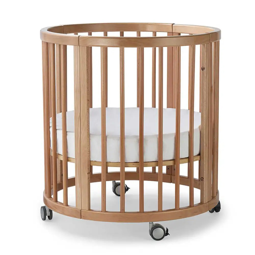 Lolli Sprout Cot made of Toshi Baby European Beech Wood with lockable wheels