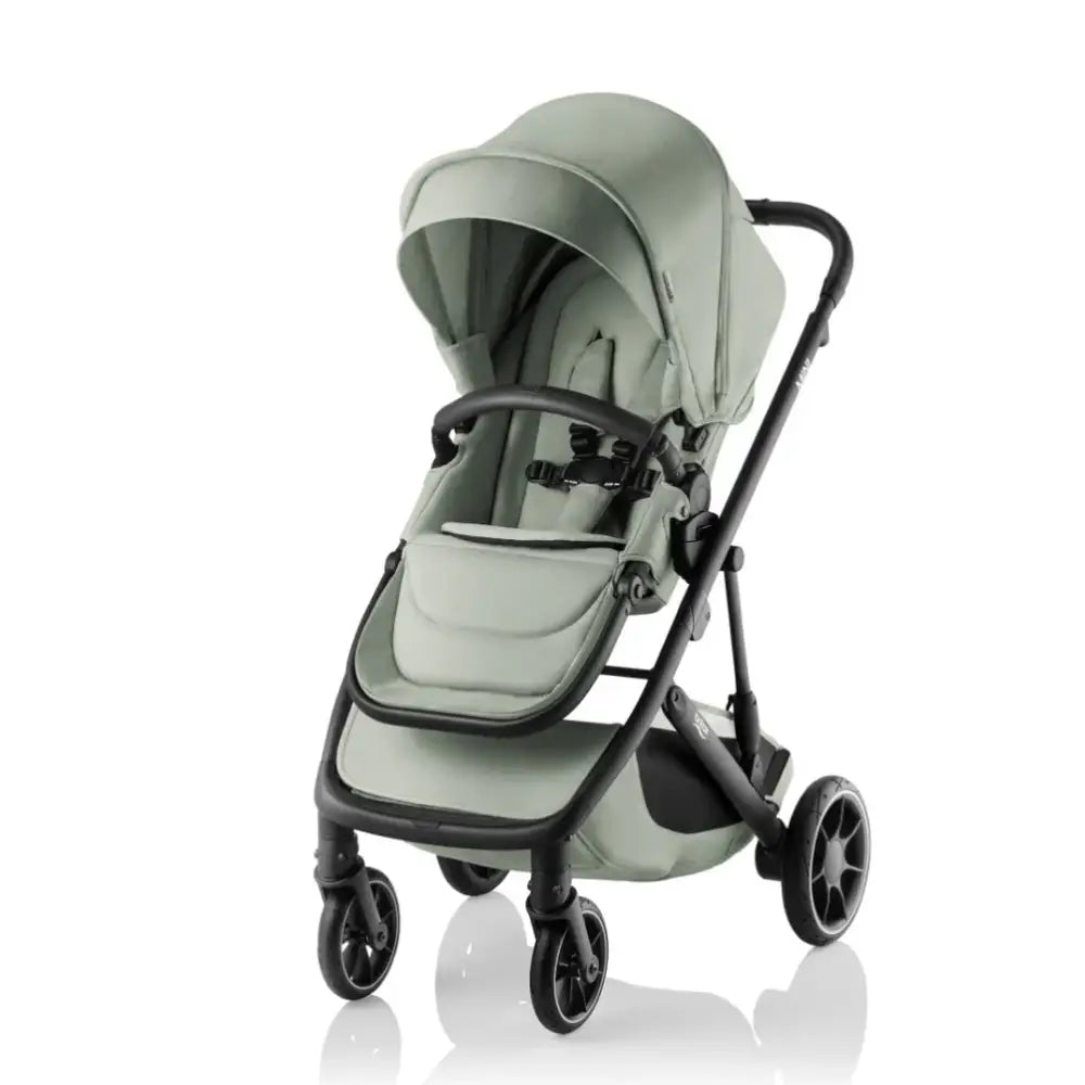 Light green Britax Mini Stroller with baby strollers and toshi baby romper options