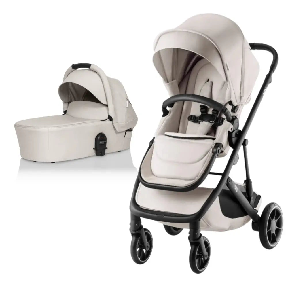 Beige Britax Mini Stroller with Bassinet and Odyssey Wagon Wheels for baby strollers