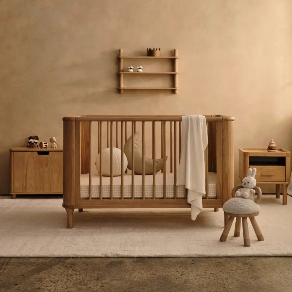 Wooden Baby Crib from Tasman Eco Willow with accessories, featuring Willow 3-door chest and baby strollers