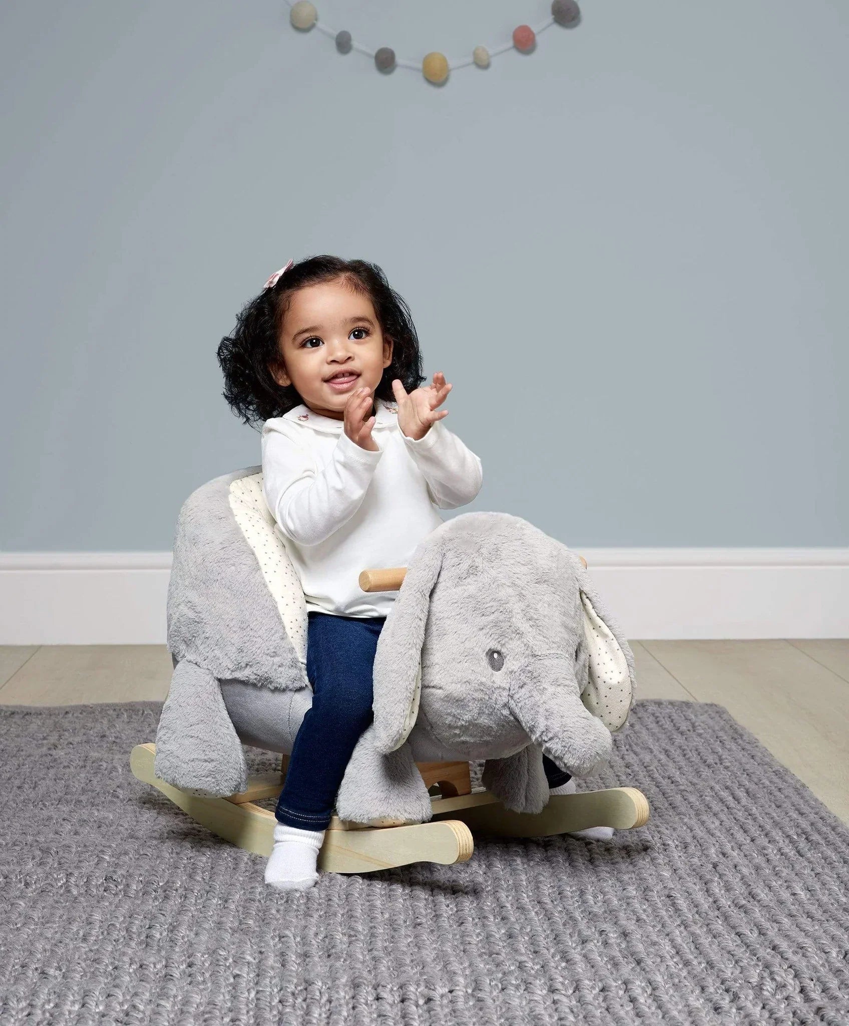 Child riding an adorable papas rocking elephant in the Mamas & Papas Rocking Elephant Ellery