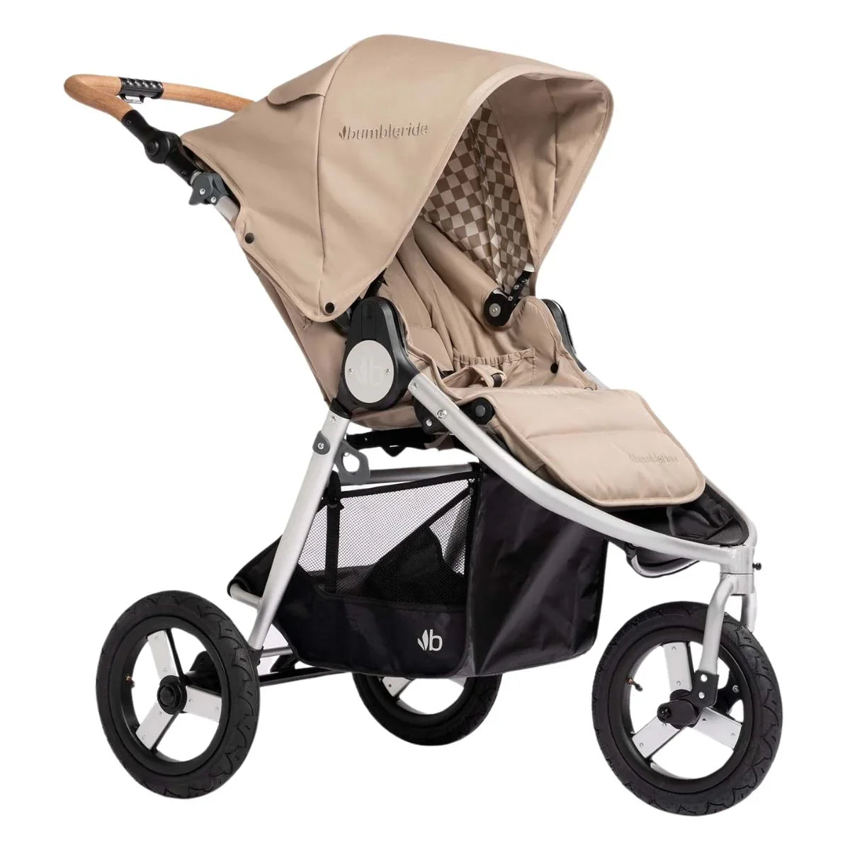 Tan and silver three-wheeled Bumbleride Indie stroller with Odyssey wagon wheels