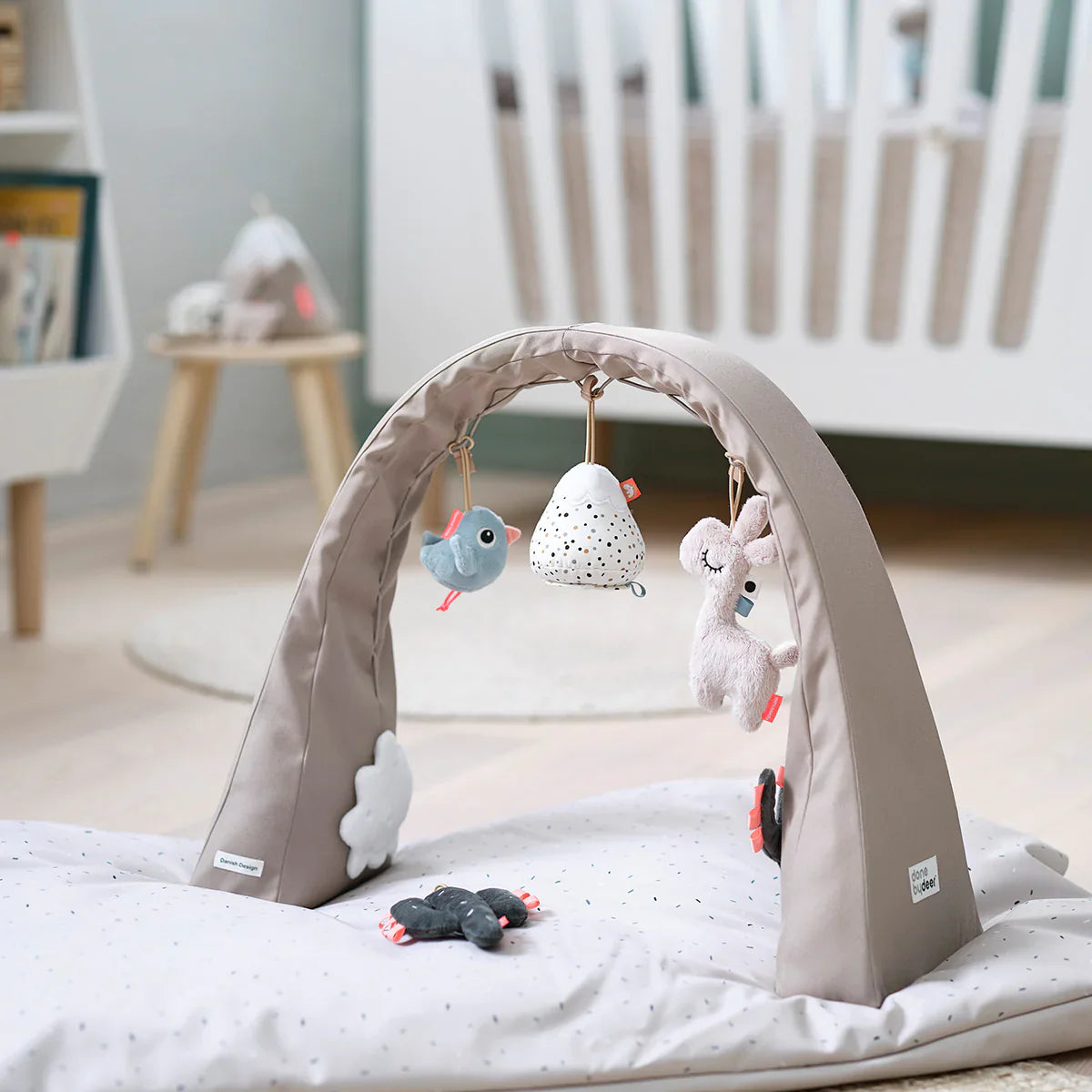 Baby activity gym with hanging toys from Done by Deer, award-winning discovery textile patch