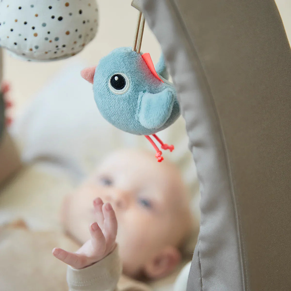Blue plush bird toy from Done by Deer Activity Gym SAND, perfect for award-winning activity gyms