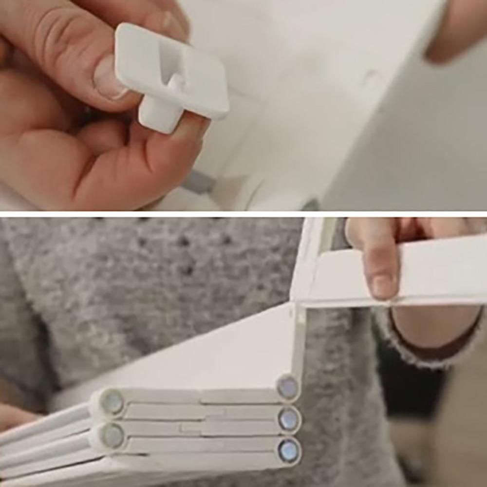 White plastic folding shelf for BabyDan Guard Me Extensions baby barrier and stroller setup