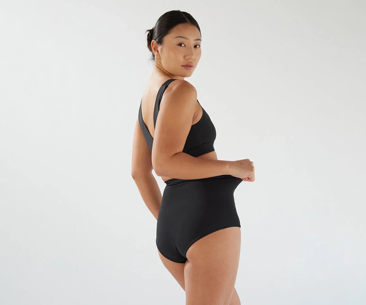 Black high-waisted underwear set from Bare Mum Postpartum for comfy postpartum wear