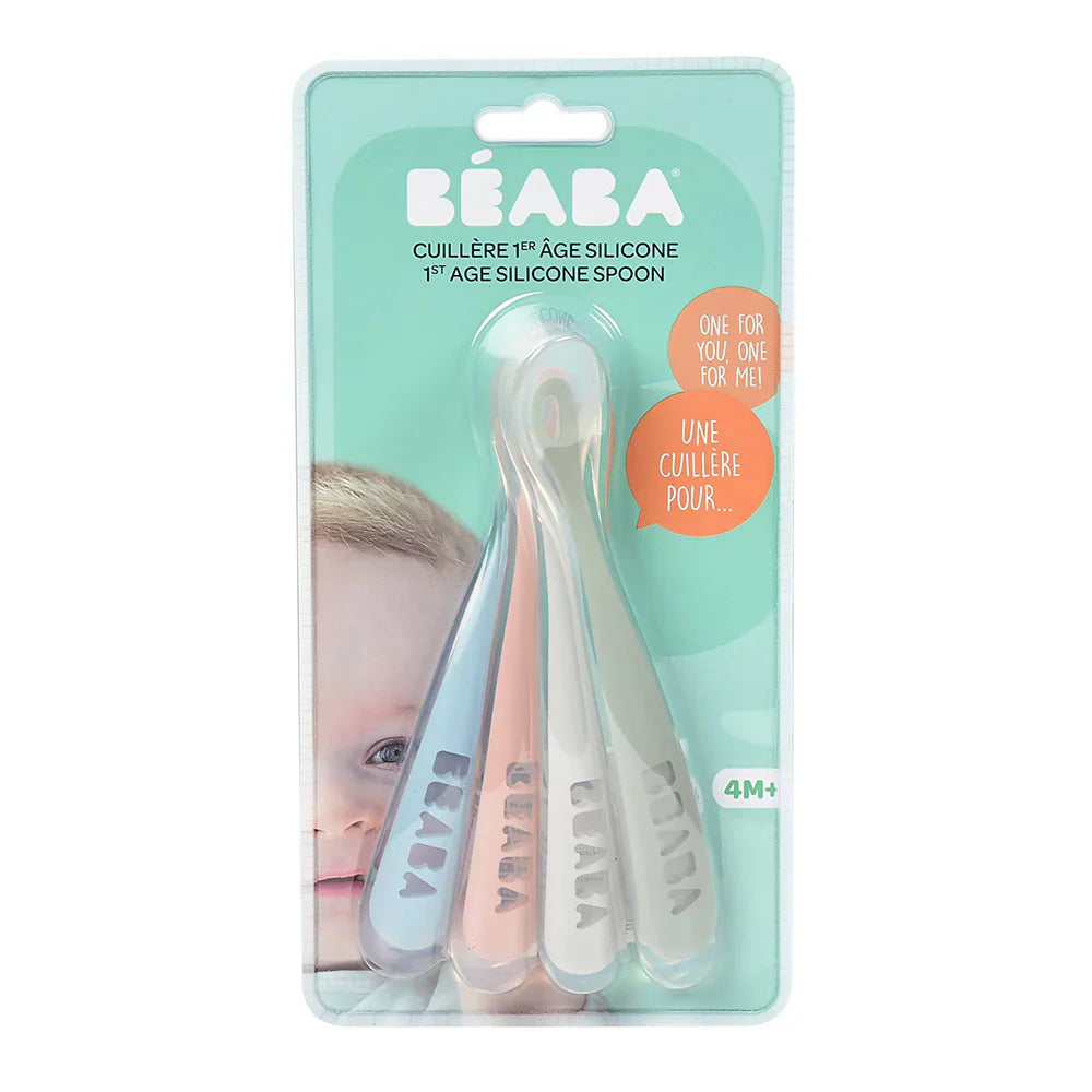 Three silicone toshi baby spoons in Beaba 1st Stage Ergonomic Spoons packaging in light blue pink grey eucalyptus