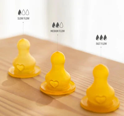 Three yellow toshi baby bottle nipples with flow rate indicators for Bibs 110ml Glass set