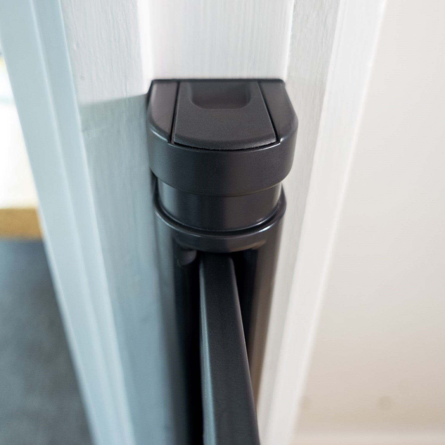 Black retractable baby gate hardware for BabyDan Guard Me Gate, perfect for baby strollers