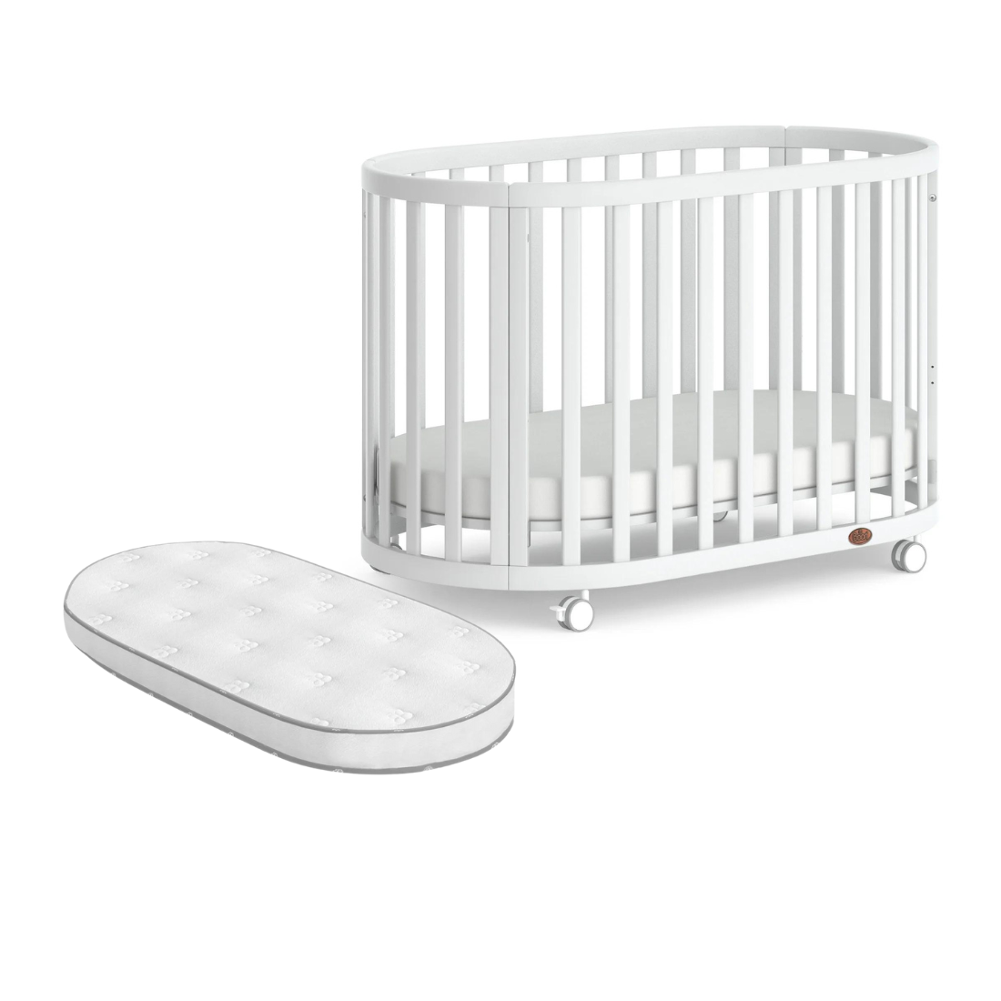 Oval white Baby crib with pocket spring mattress from Boori Eden Oval series