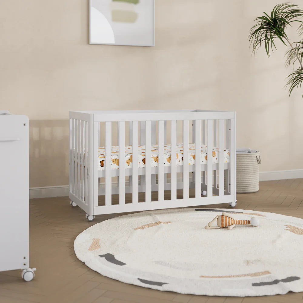 White baby crib with Boori Turin Compact Cot and pocket spring mattress setup