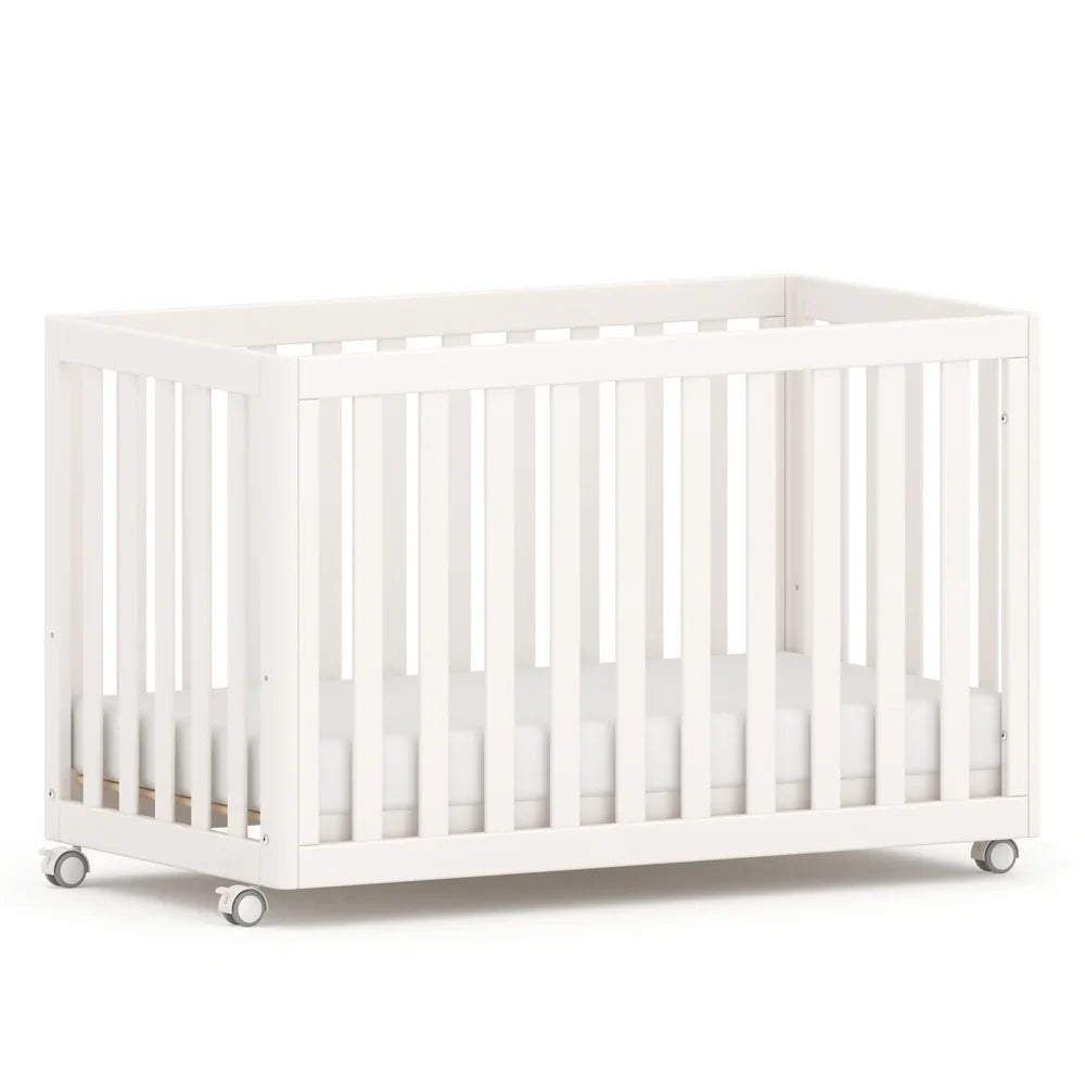 White wooden baby crib with Boori Turin Compact and pocket spring mattress setup