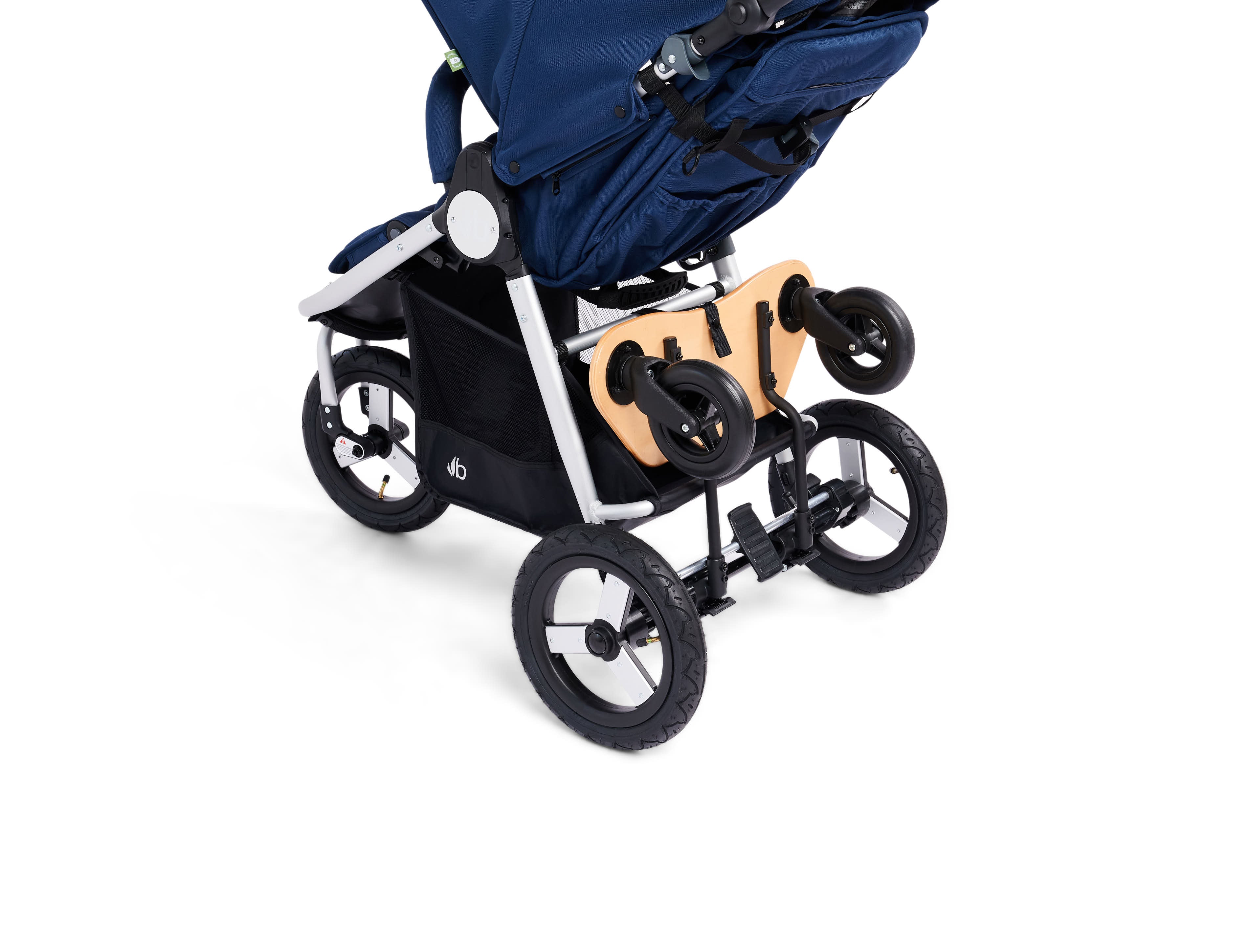Navy blue Bumbleride Mini Board attached to baby stroller with ride-on board and Toshi Baby Romper