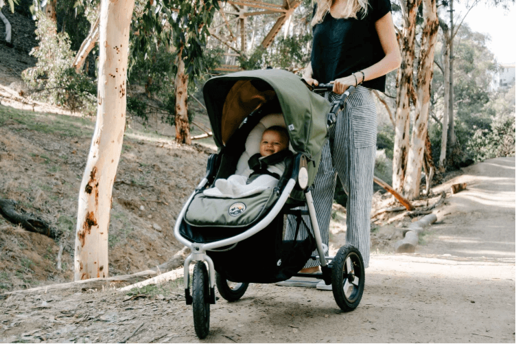 Olive green baby stroller with Bumbleride Organic Cotton Infant Insert for eco-friendly baby strollers