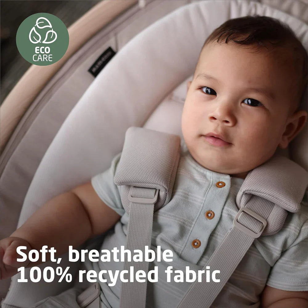 Baby in recycled fabric seat of Maxi Cosi Cassia Swing Odyssey for comfy baby strollers