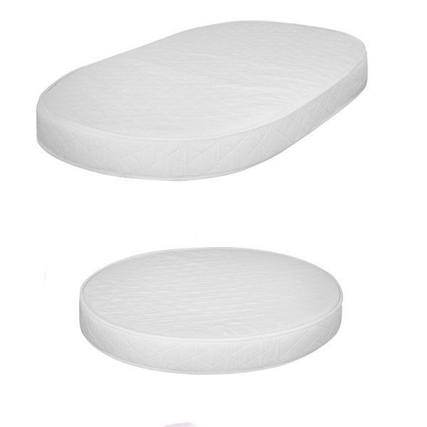 White cushioned pads from Cocoon Nest Natural junior bed, perfect for baby strollers