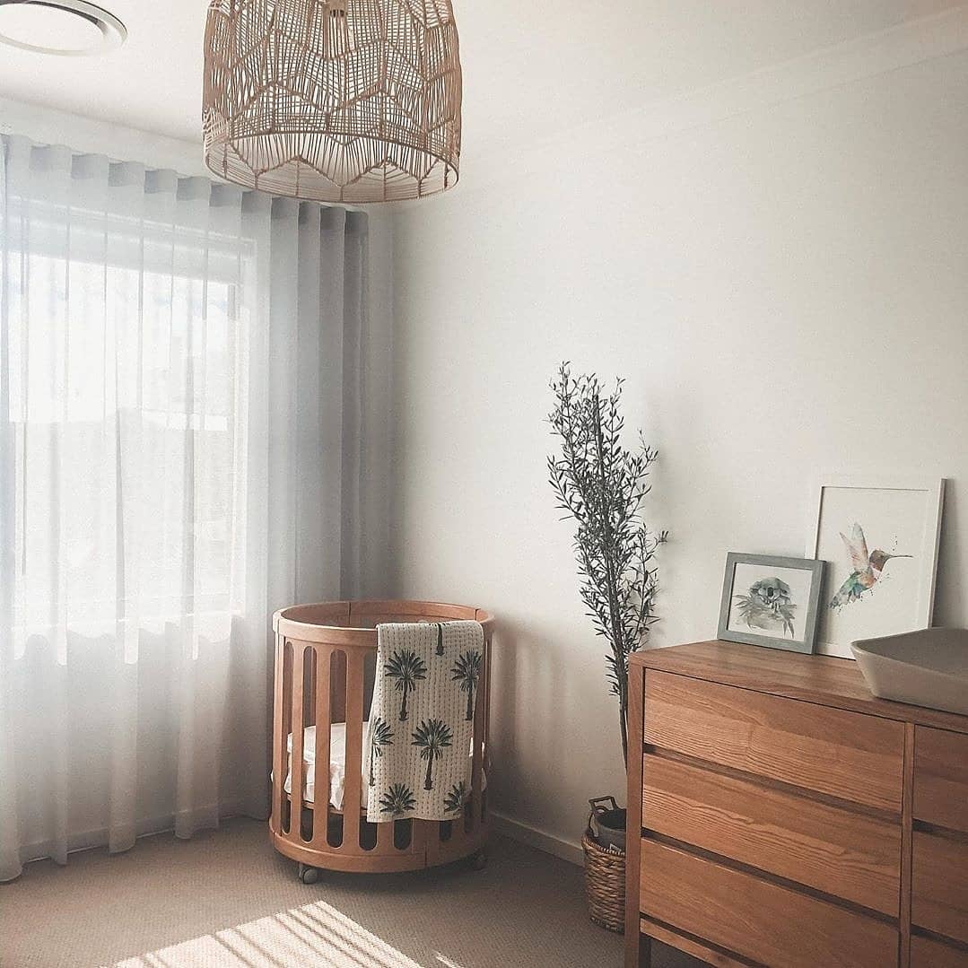 Round wooden crib from Cocoon Nest Natural ideal as a junior bed for Toshi Baby