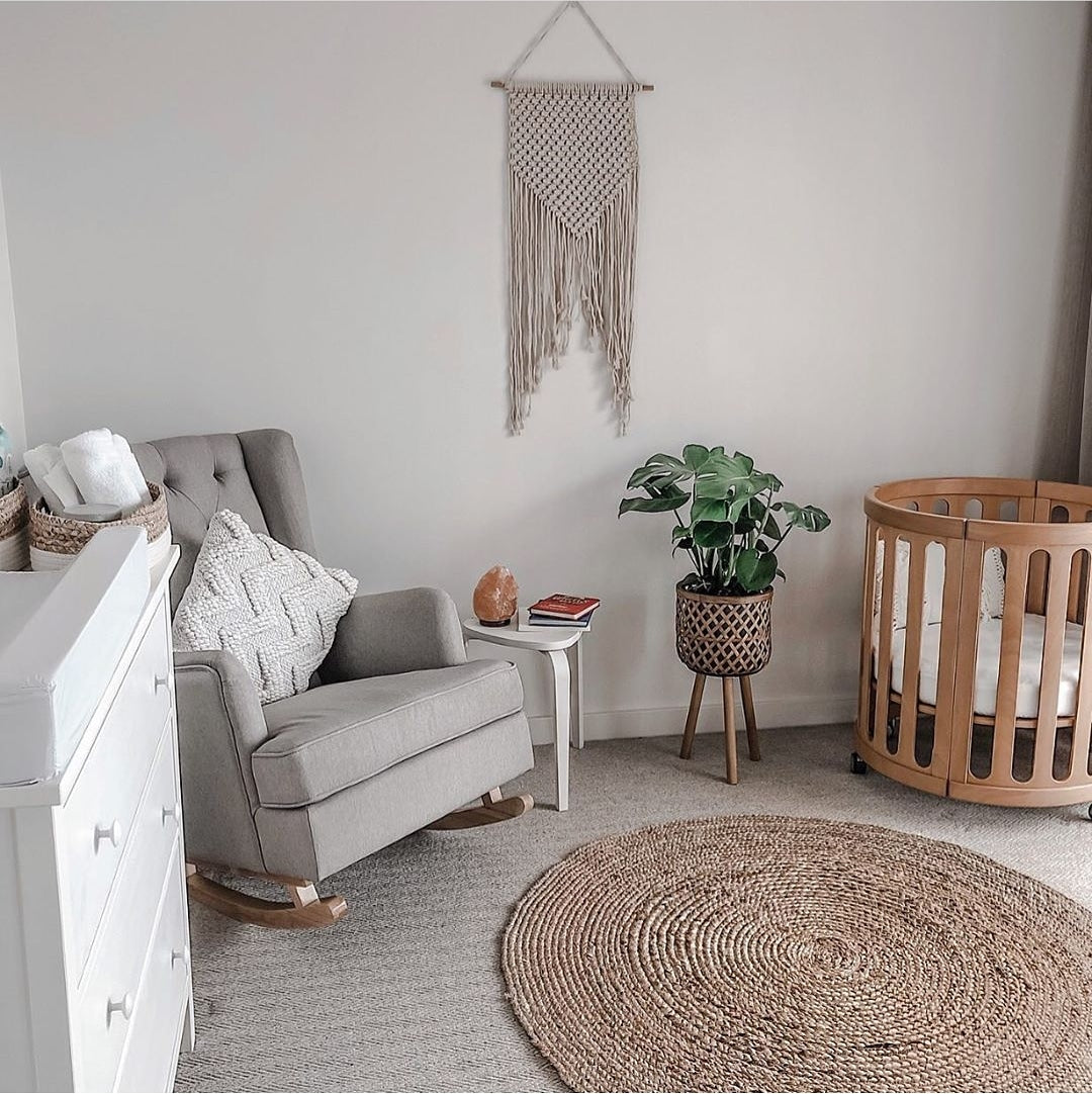 Neutral nursery interior with Cocoon Nest Natural junior bed and Toshi Baby accessories