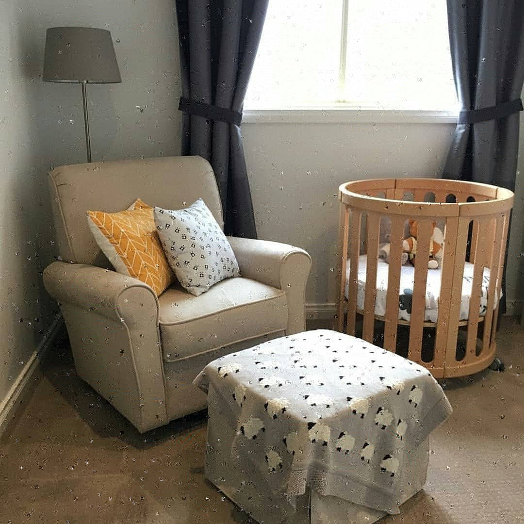 Nursery room with round Cocoon Nest Natural cot, perfect as a junior bed for babies
