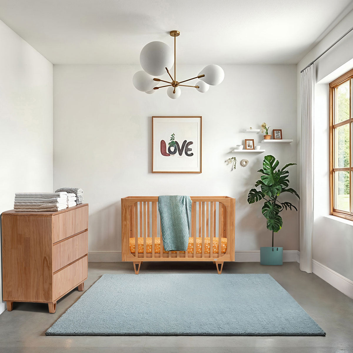 Cocoon Vibe nursery with wooden crib and dresser, perfect Toshi Baby complete nursery package