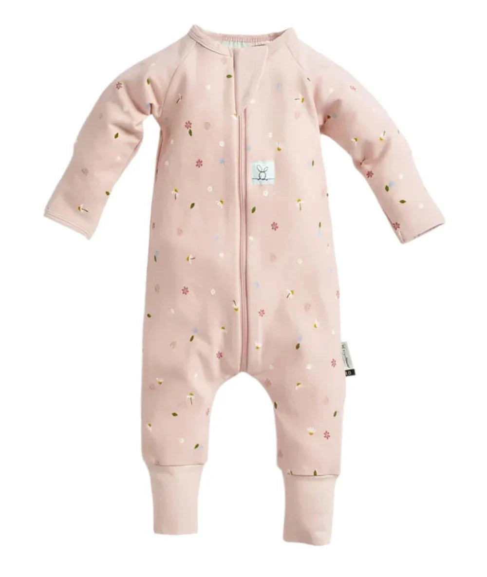 Pink baby sleepsuit with floral pattern from Ergopouch Long Sleeve Layer 0.2TOG made of organic jersey cotton