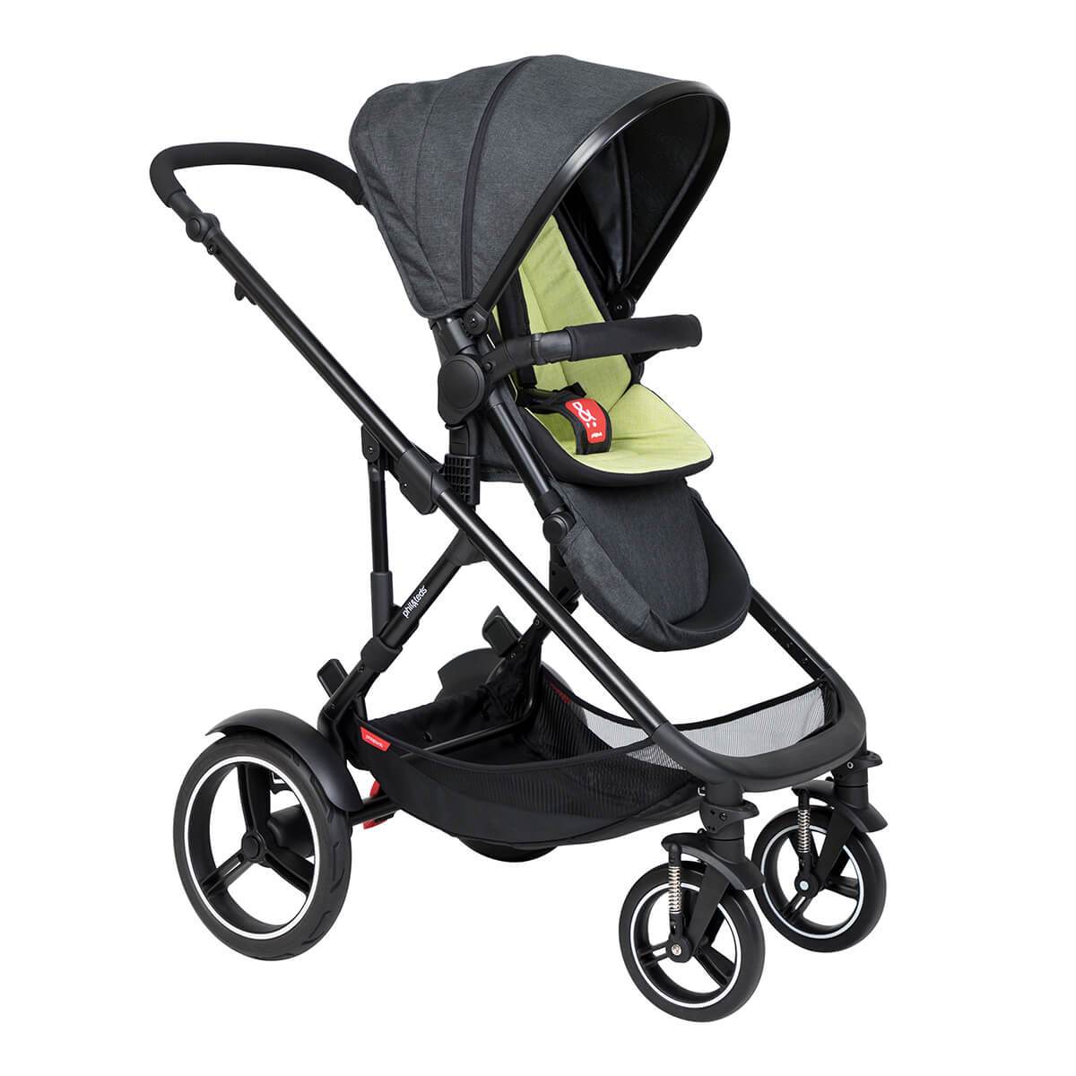 Black and green baby stroller in Phil&Teds Voyager with Odyssey wagon wheels