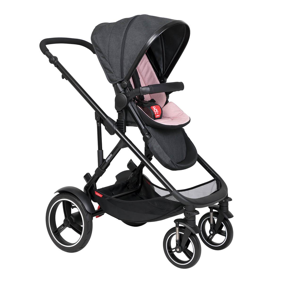 Black and pink baby stroller featuring Odyssey Wagon Wheels for smooth rides