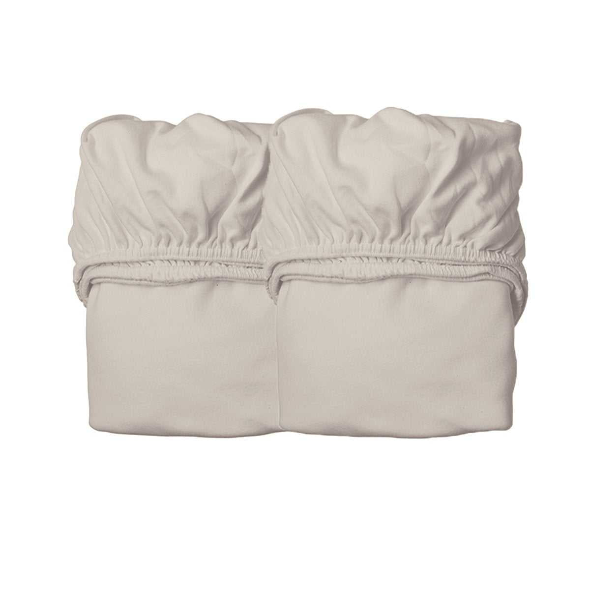 Two folded Leander Organic Fitted Sheets for baby strollers displayed on toshi baby site