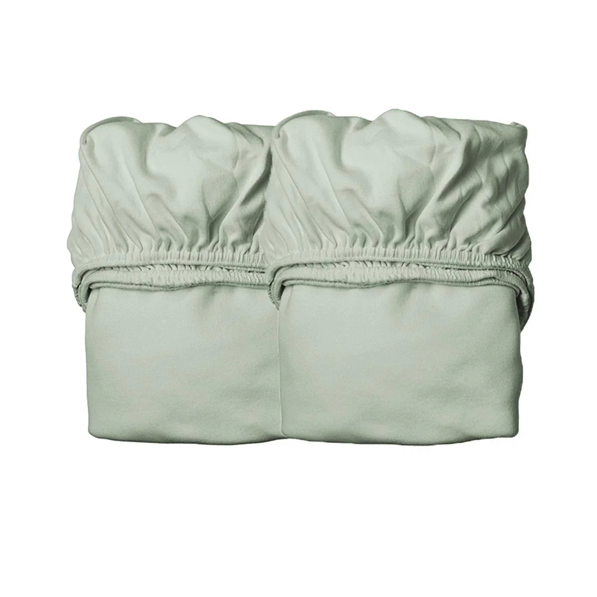 Two folded light green Leander Organic Fitted Sheets made from organic cotton jersey for toshi baby