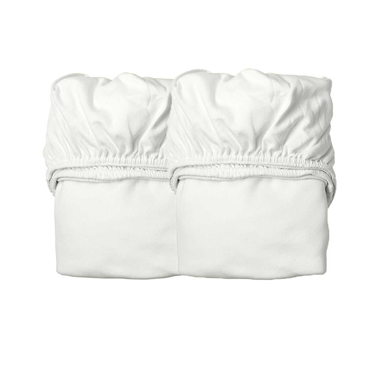 Two white Leander Organic Fitted Sheets made from soft organic cotton jersey for toshi baby