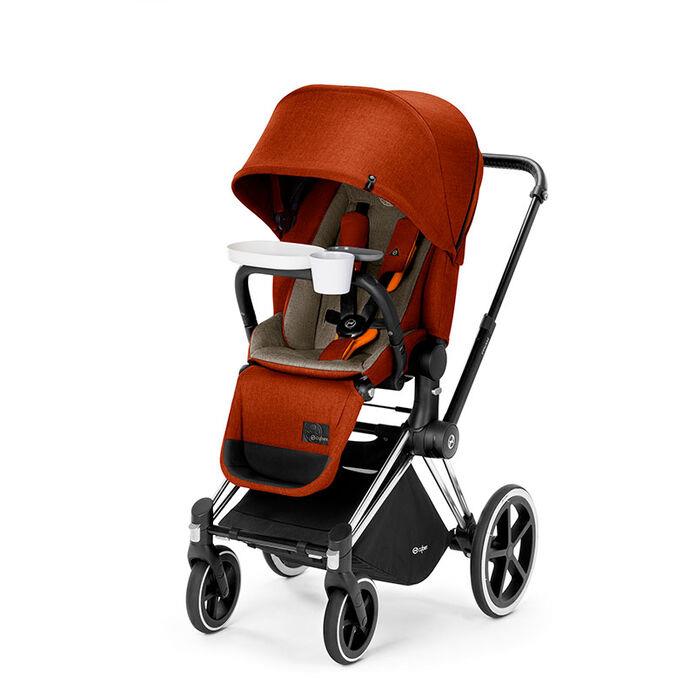 Orange and black baby stroller with Cybex Gold Snack Tray for Toshi Baby Romper style