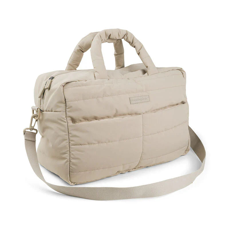 Beige deer quilted changing bag with exterior zip closure and insulated interior pocket
