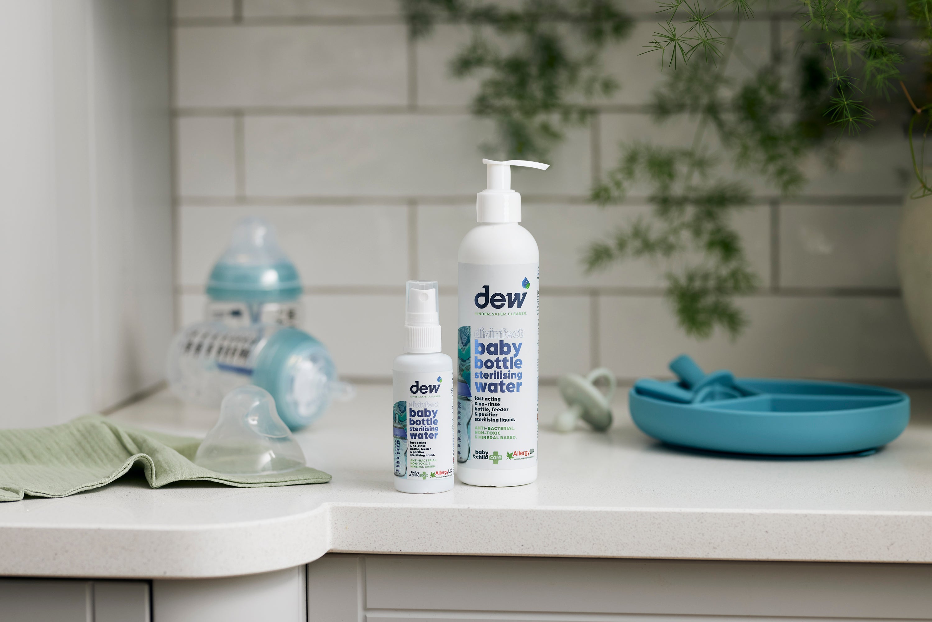 Baby bottles cleaning with Dew Baby Bottle Sterilising Water 65ml for safe baby strollers