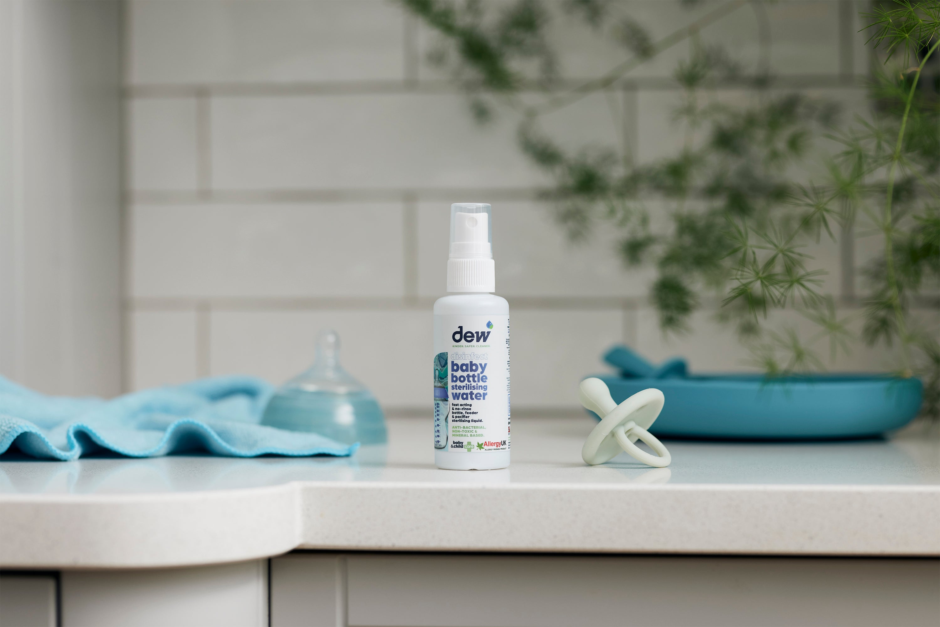 White spray bottle for Dew Baby Bottle Sterilising Water 65ml, perfect for baby bottles