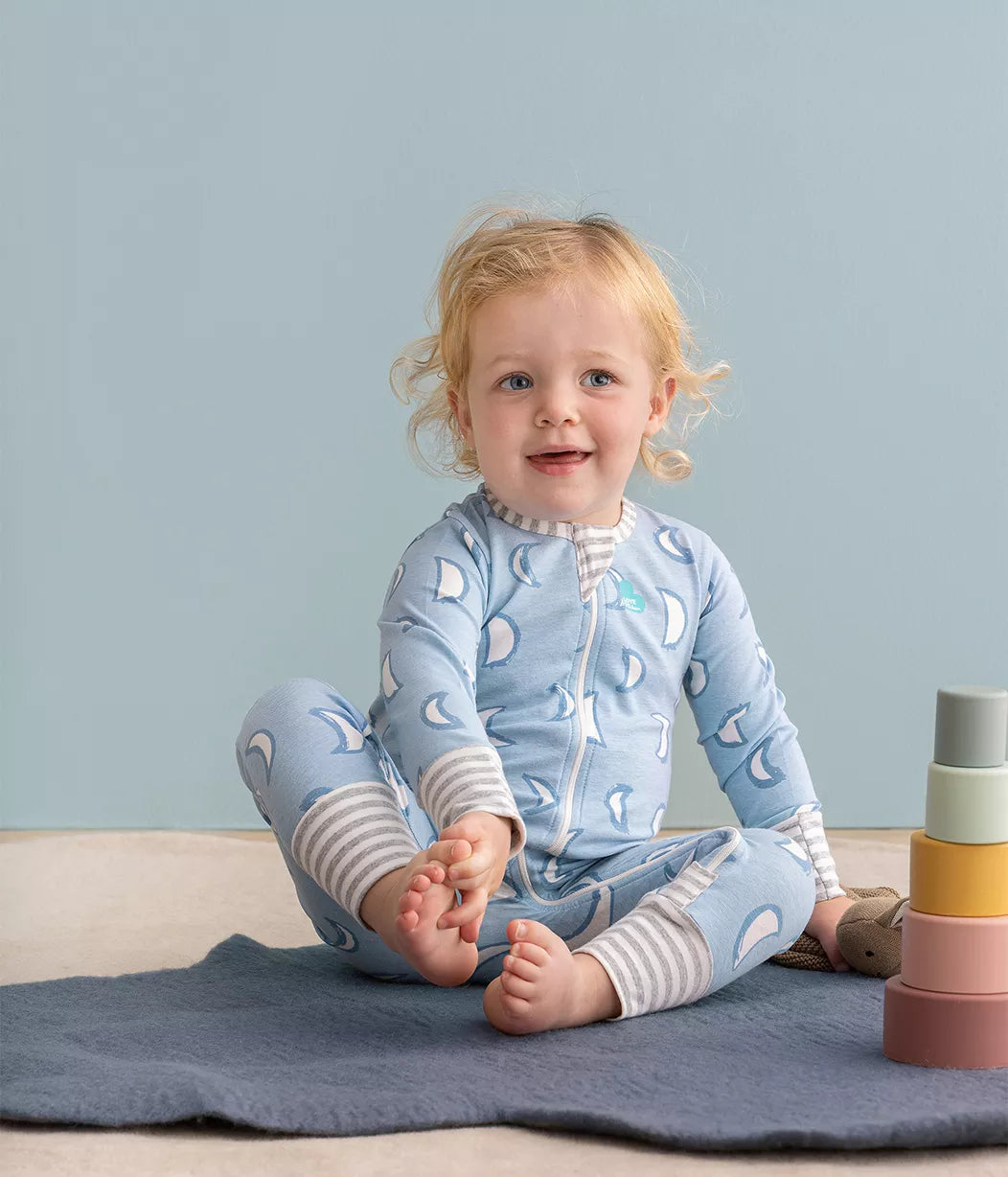 Child’s blue patterned dream enclosed foot romper perfect for baby strollers and comfy naps