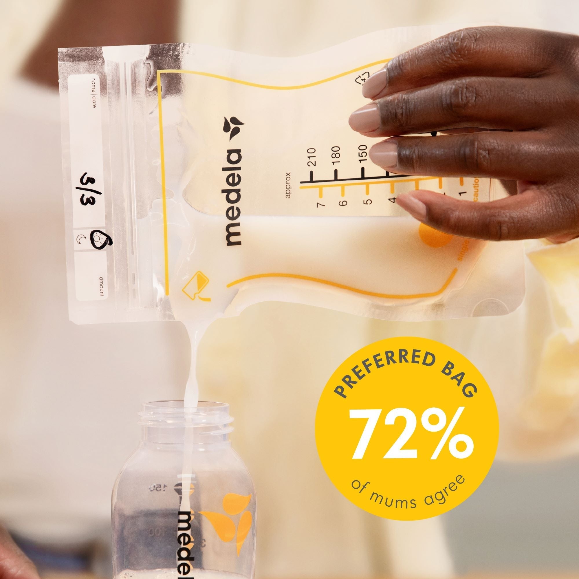 Easy pour breastmilk from Toshi Baby Storage Bags into a bottle for convenient feeding