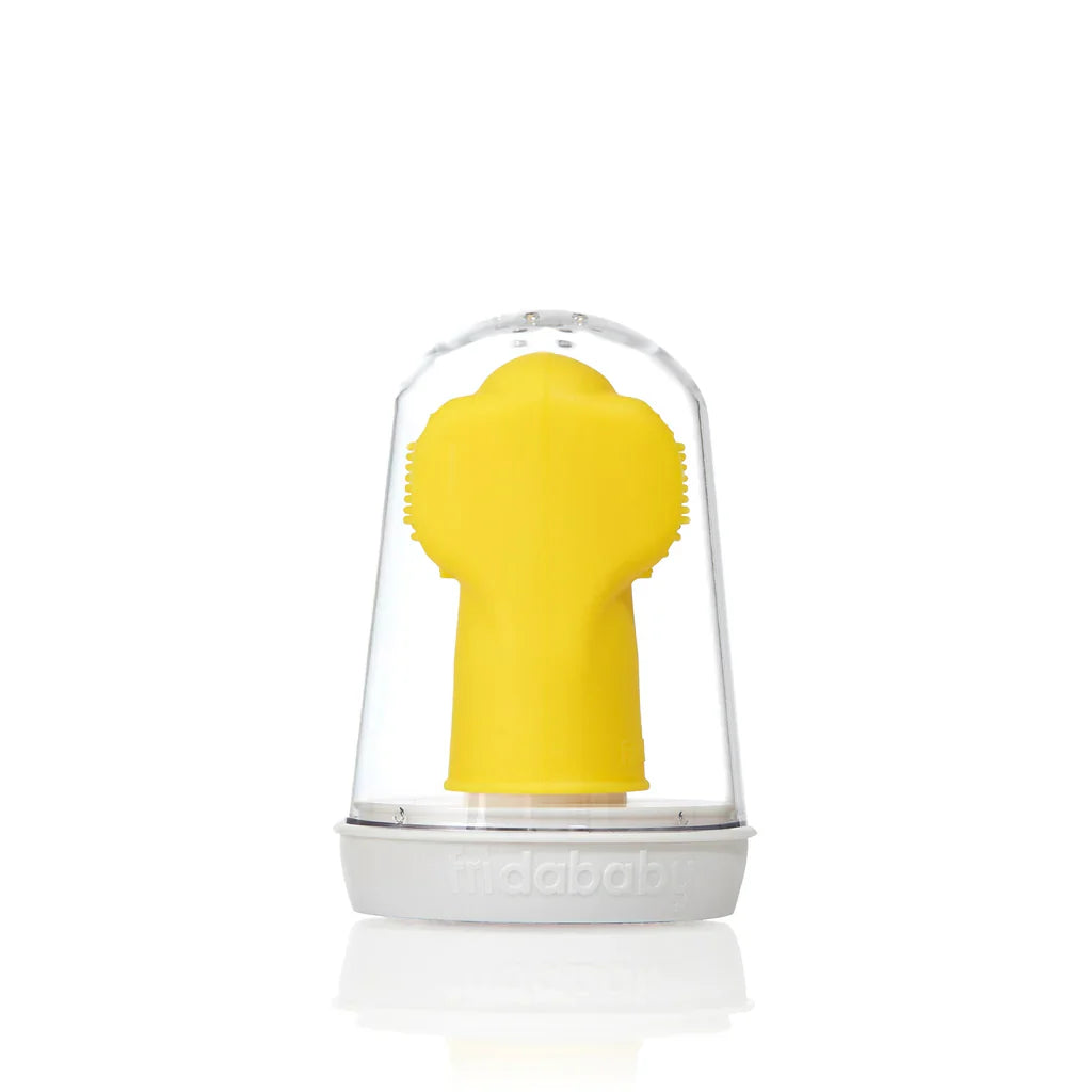 Yellow Frida Finger Toothbrush in clear case perfect for Toshi Baby Romper and Odyssey Wagon Wheels playtime