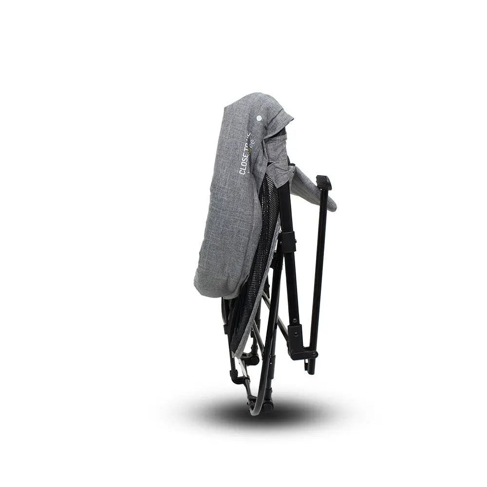 Folded gray baby stroller from Vee Bee Close To Me Co-Sleeper, perfect with Toshi Baby Romper