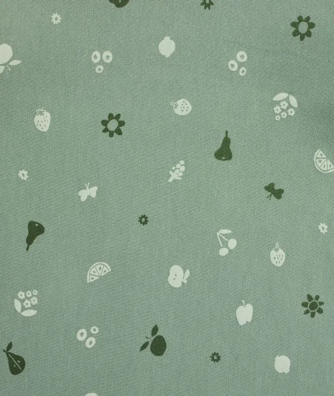 Green fabric jersey sleeping bag with fruit and flower pattern for Toshi Baby and baby strollers