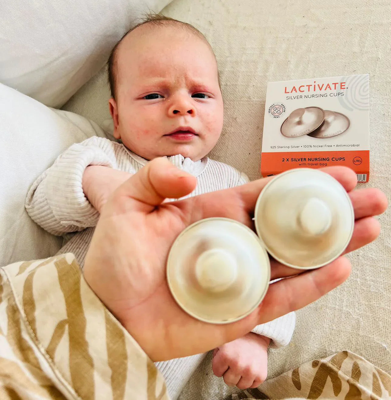 Lactivate Silver Nursing Cups for healing sore nipples, compatible with baby strollers