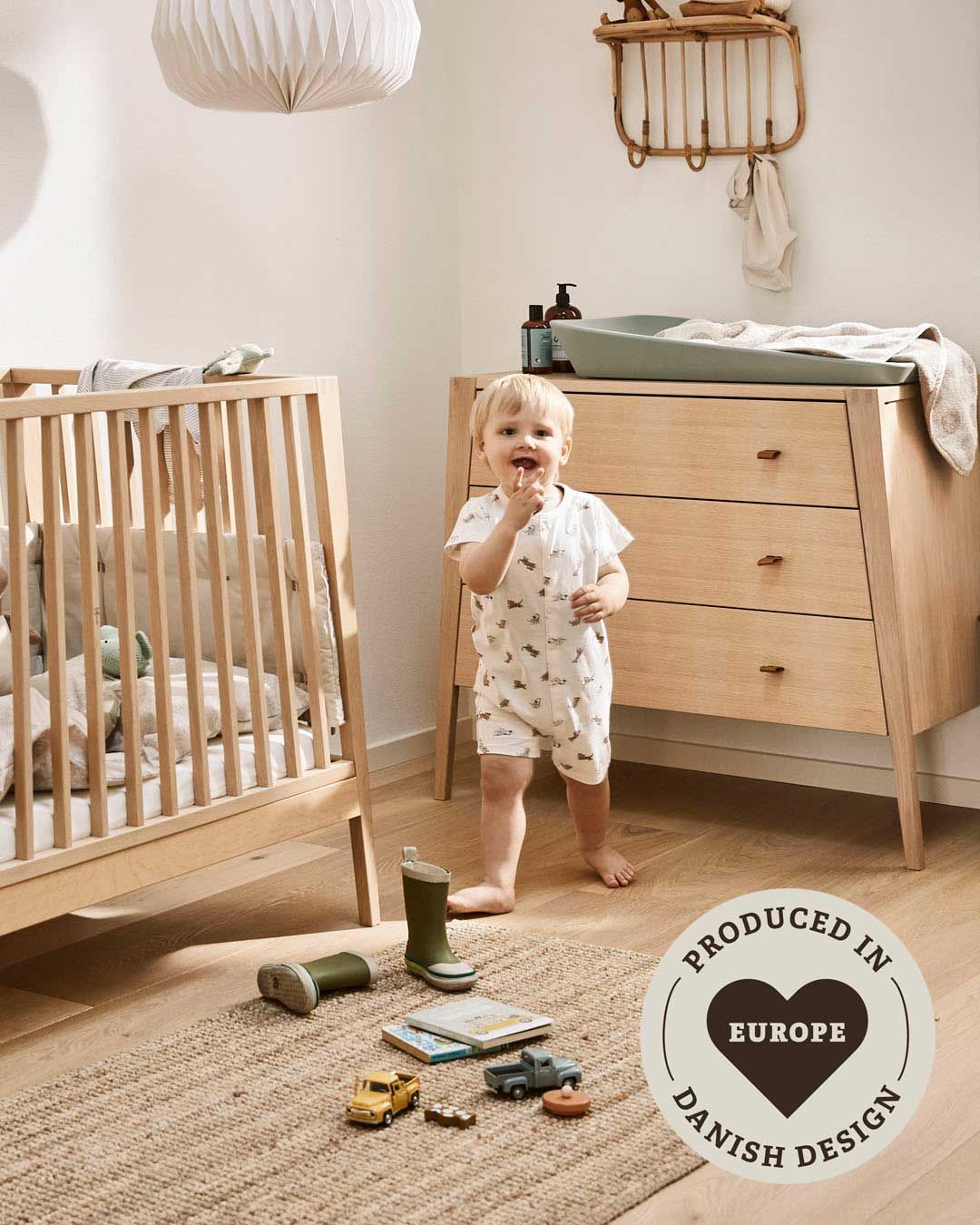 Wooden baby room furniture showing the Toshi Baby Linea Cot Natural 120cm size