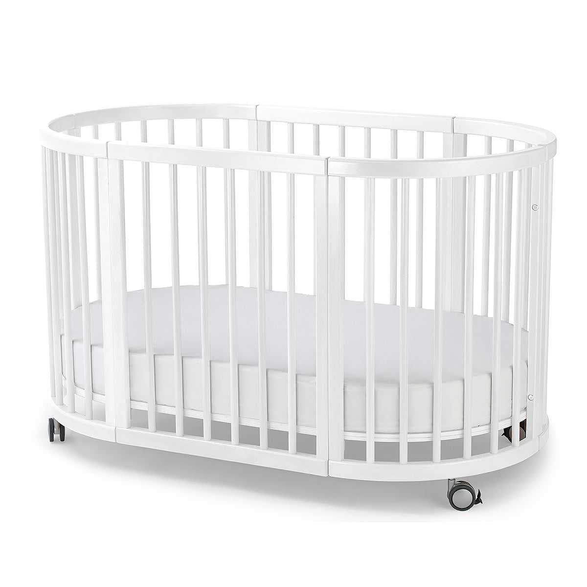 Oval white baby crib from Lolli Sprout Cot 4 in 1 made of European Beech Wood Australian made