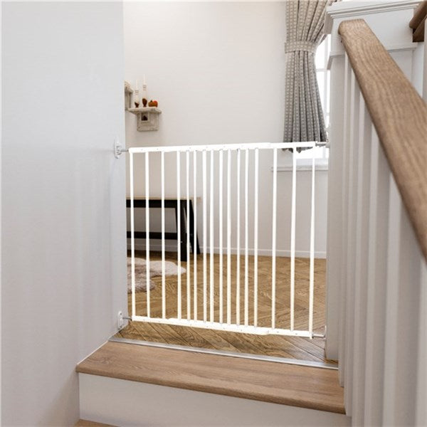 White safety gate from Dogspace Lucky extending pet gate, perfect for toshi baby romper playtime