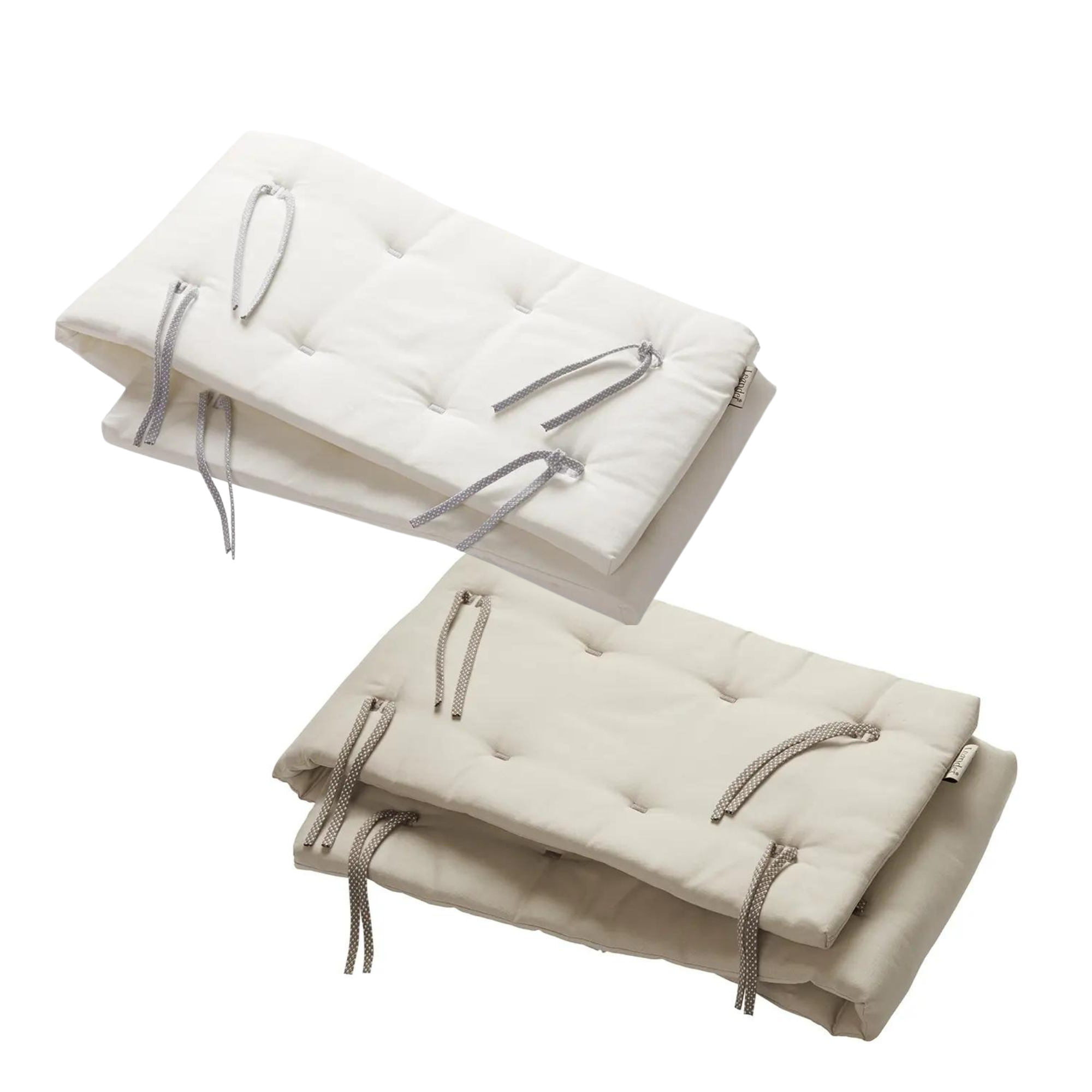 Two quilted tie-fastened cushions on Luna Cot Bumper, perfect for Toshi Baby and baby strollers