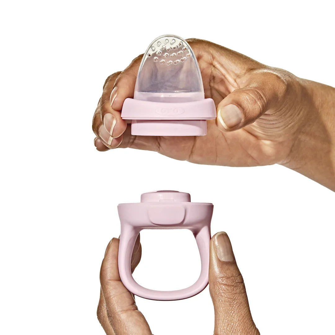 Pink baby food feeder for Toshi Baby, OXO Tot Silicone Self-Feeder for on-the-go uses