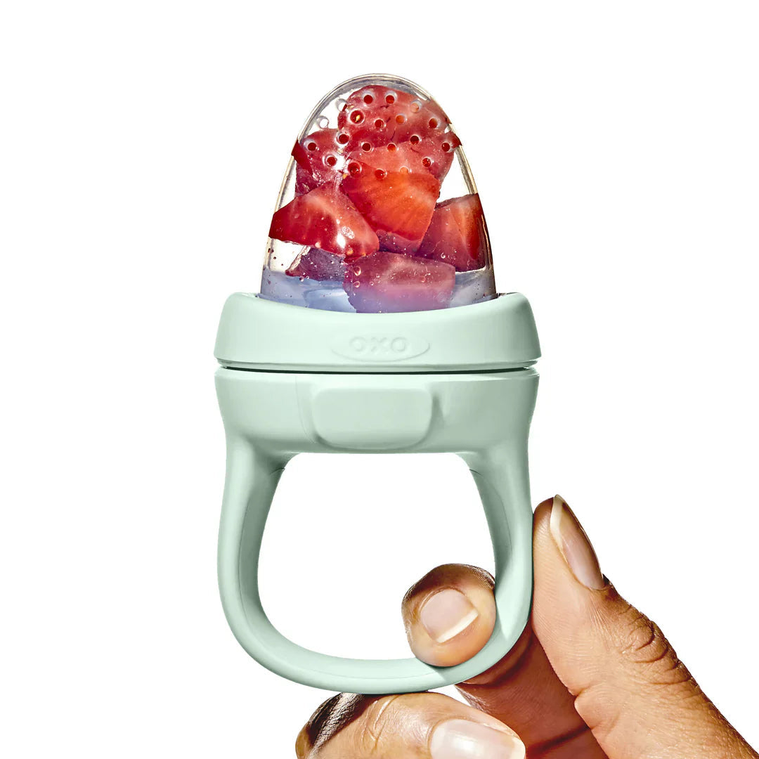 Oxo Tot Silicone Self-Feeder with strawberries for Toshi Baby, easy to use with baby strollers