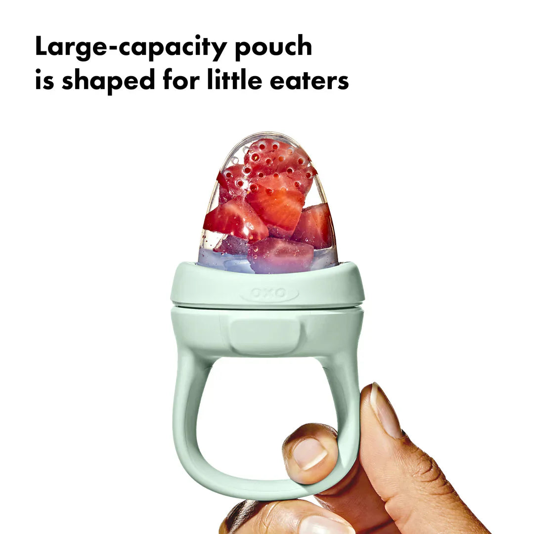 Baby food feeder with strawberries OXO Tot Silicone Self-Feeder for Toshi Baby on baby strollers