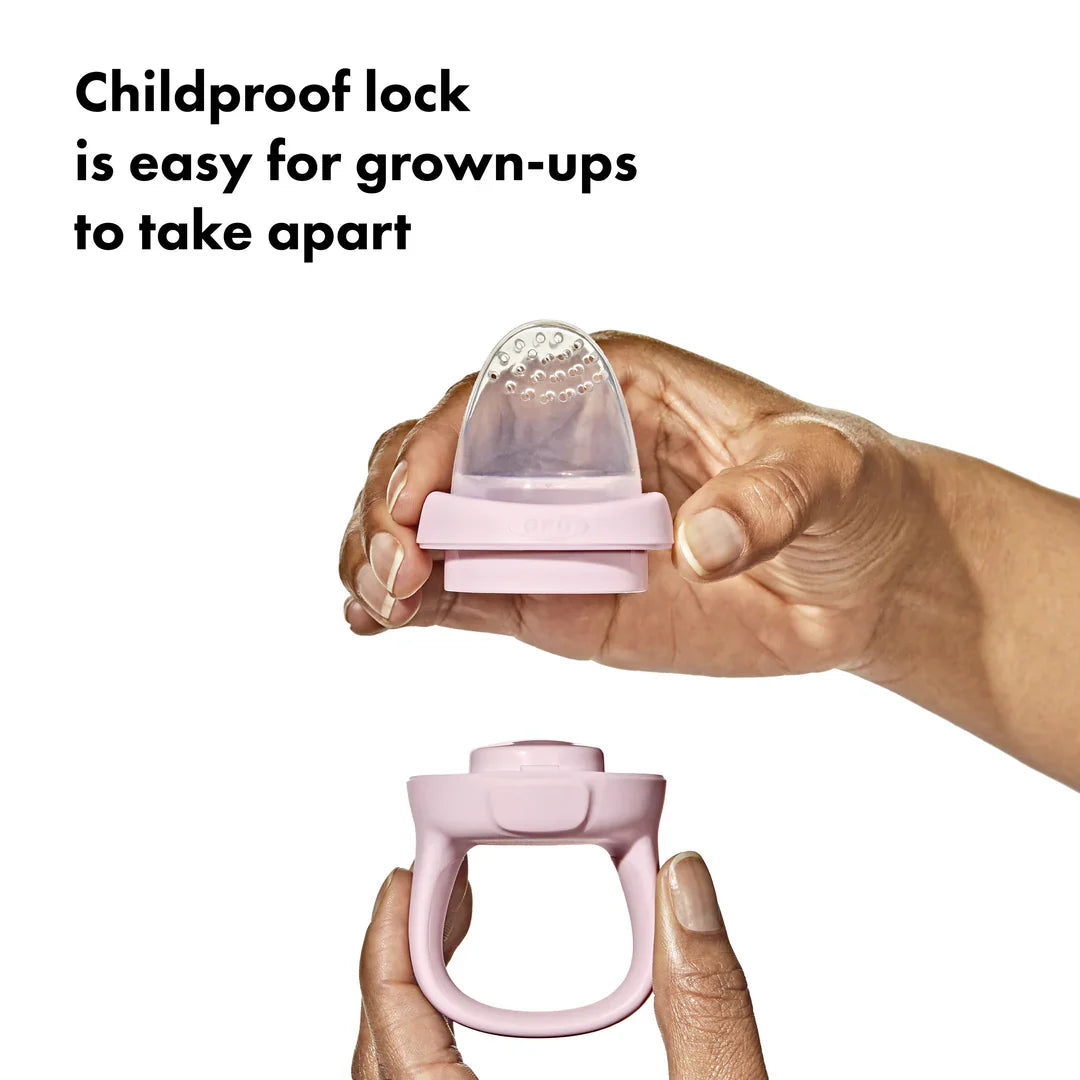 Pink baby food feeder OXO Tot Silicone Self-Feeder soothe teething tots Toshi Baby