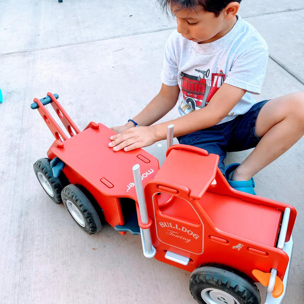 Red wooden toy tow truck from Moover Classic Mack for Toshi Baby and baby strollers fun