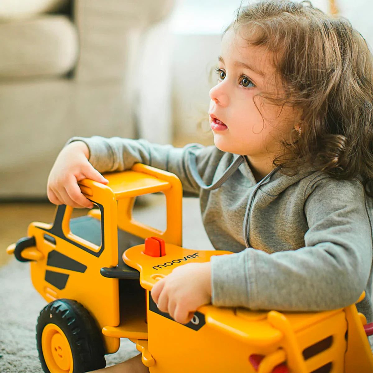 Yellow wooden toy truck from Moover Toys Classic Dump Truck line for Toshi Baby